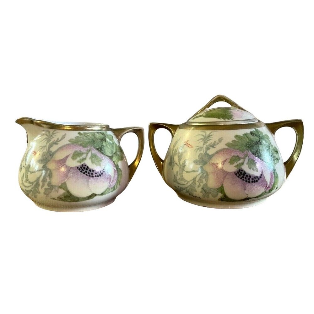 D & E.G. Royal Austria Handpainted Artist Signed Purple Floral Creamer & Sugar